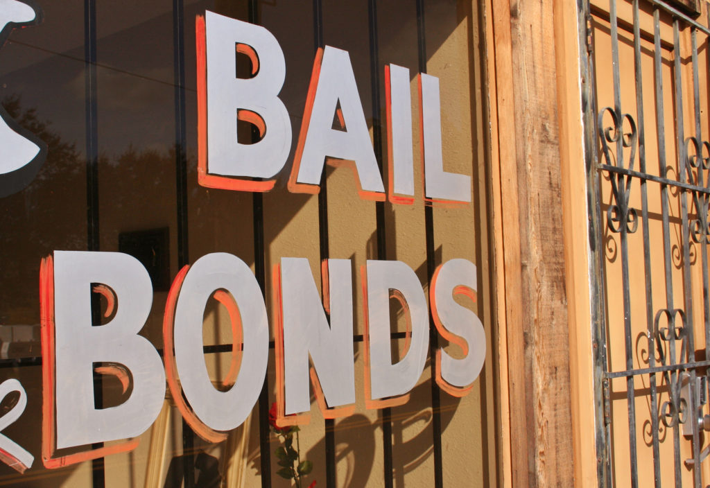 Bail Bonds written on glass